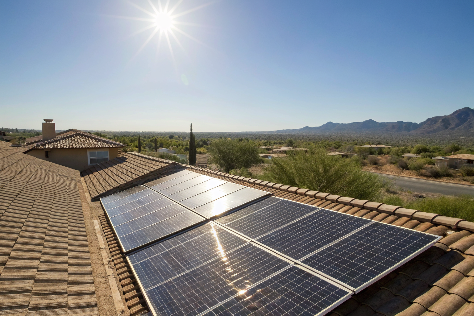 Rooftop solar panels on Arizona home under bright sun, showcasing coverage necessity.