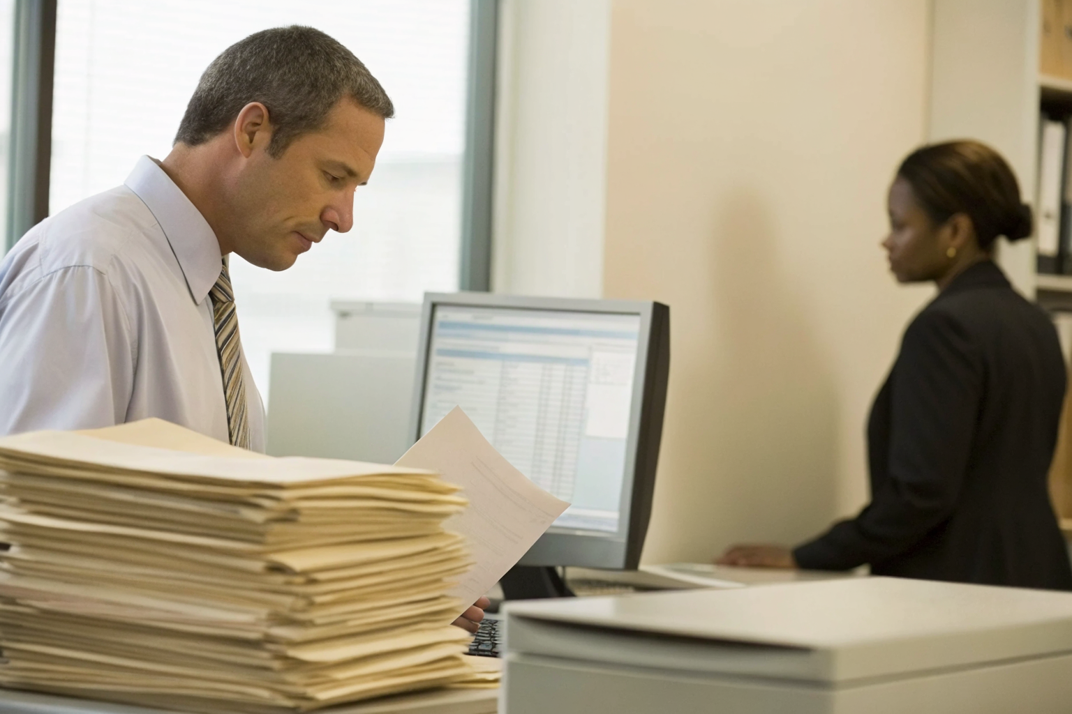 Official reviewing complaints at the Arizona Department of Insurance.