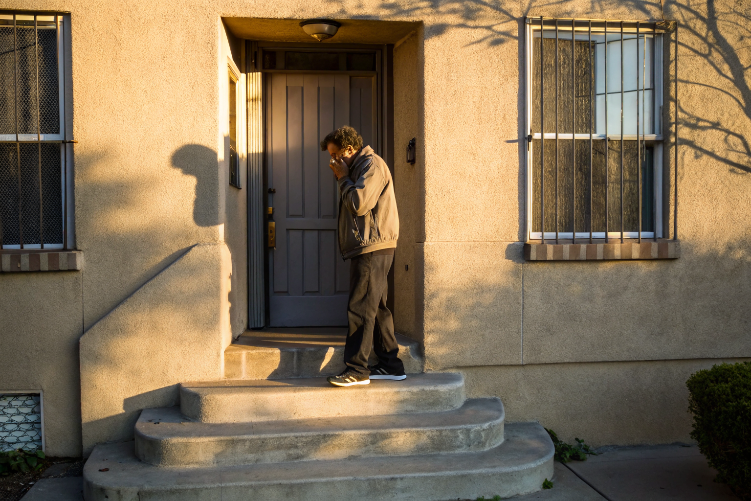Homeowner outside insurance office with ARS 20-1652 notice.