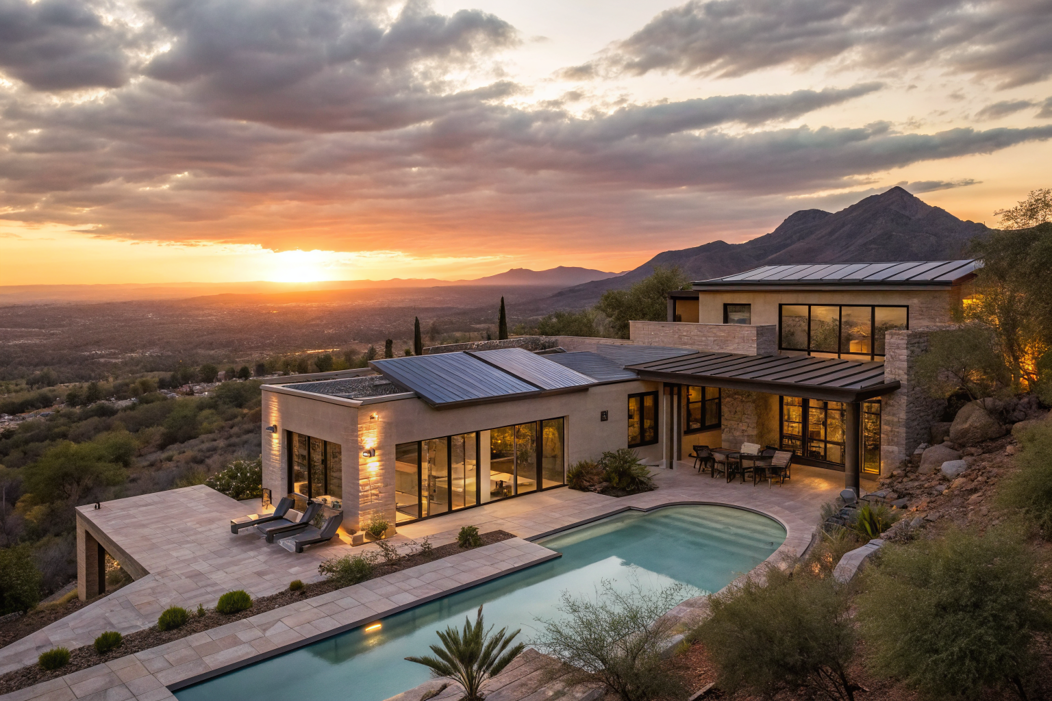 Arizona home with solar panels and pool at sunset, emphasizing specialty insurance.