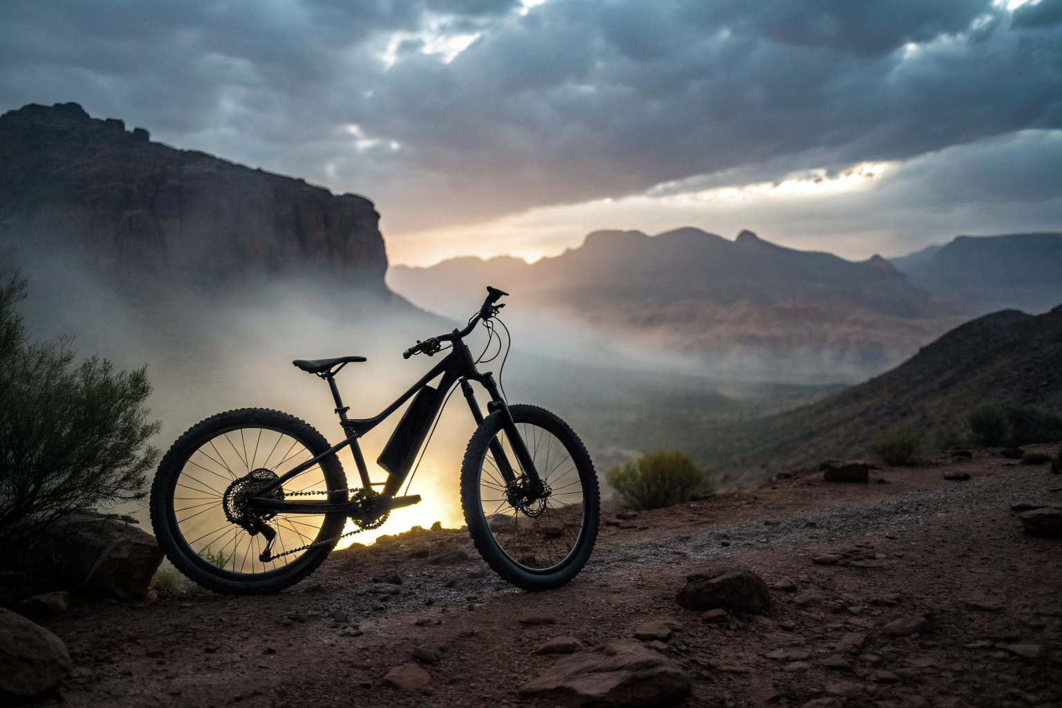 E-bike in Arizona desert at dusk with dramatic lighting and fog.