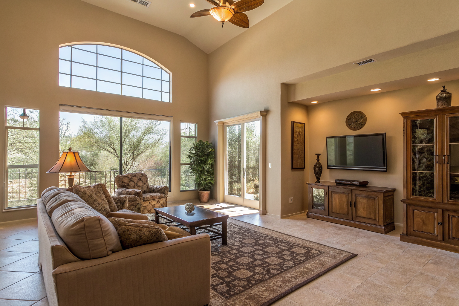 Empty Arizona home living room with sunlight, symbolizing rental or snowbird gaps.